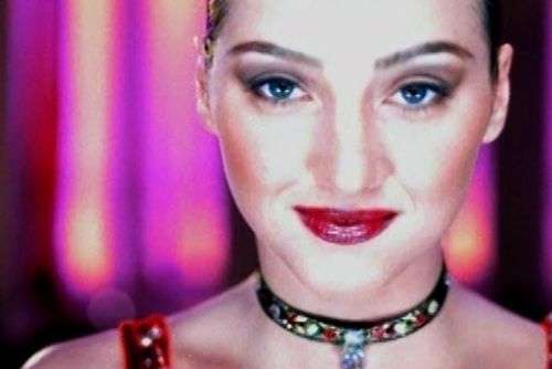 Dynamic stage performance of a guitarist during a live rock concert.