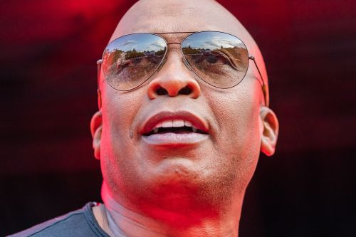 Dynamic stage performance of a guitarist during a live rock concert.