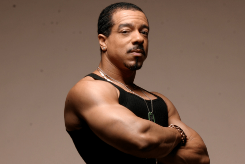 Dynamic stage performance of a guitarist during a live rock concert.