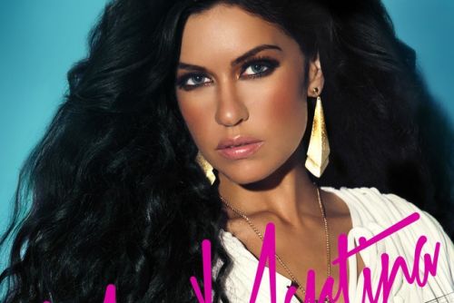 Dynamic stage performance of a guitarist during a live rock concert.